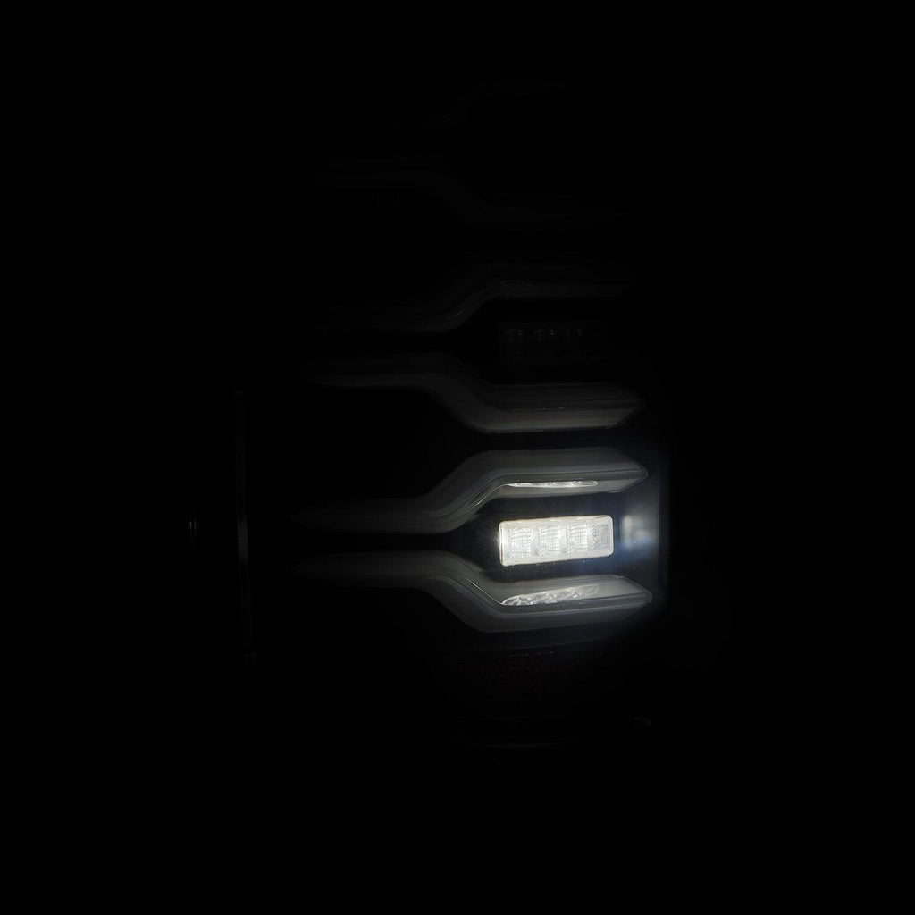 Alpha Rex 14-18 Chevrolet Silverado 1500 / 15-19 Silverado 2500HD/3500HD / 15-19 GMC Sierra 3500HD Dually LUXX-Series LED Tail Lights Black