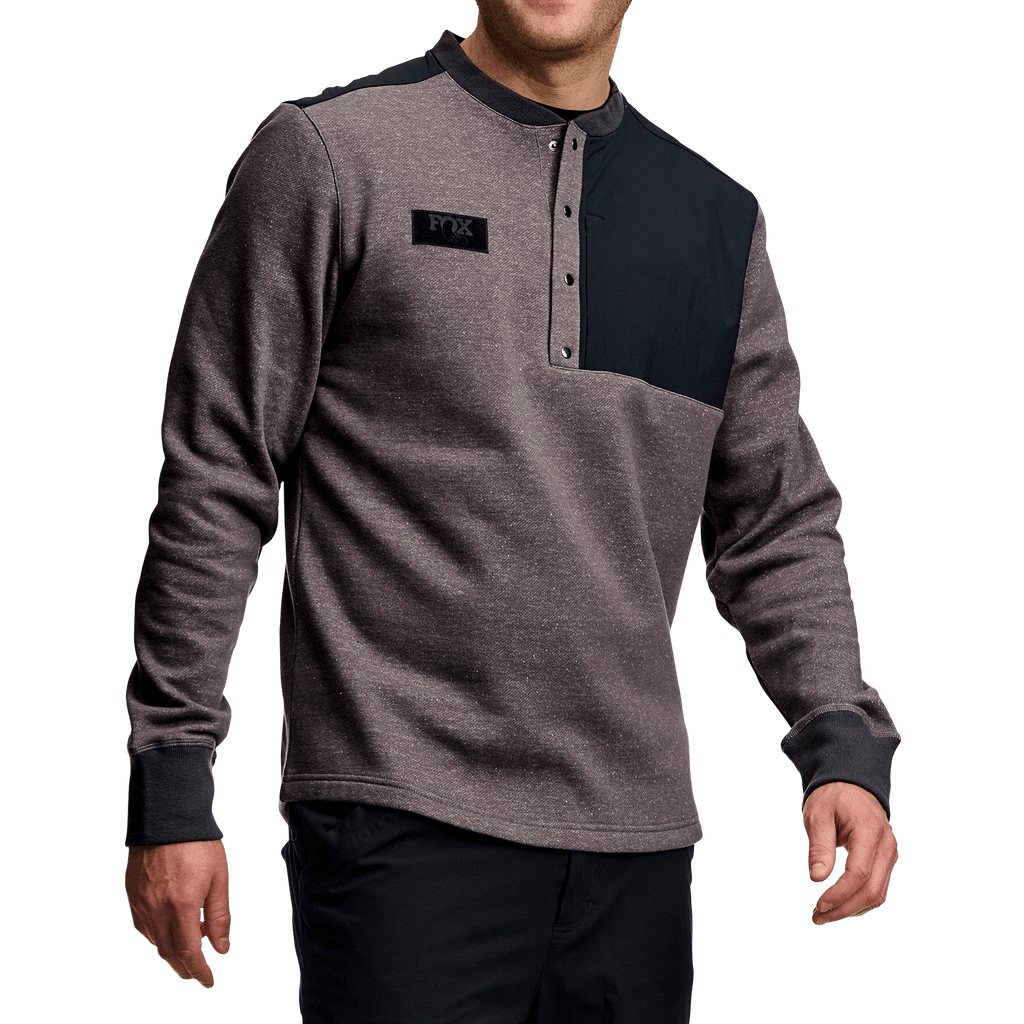 https://serenity-foxfactory.asset.akeneo.cloud/fox_asset_family/media/SSG_Apparel_OverLandHenley_GREY_1.png