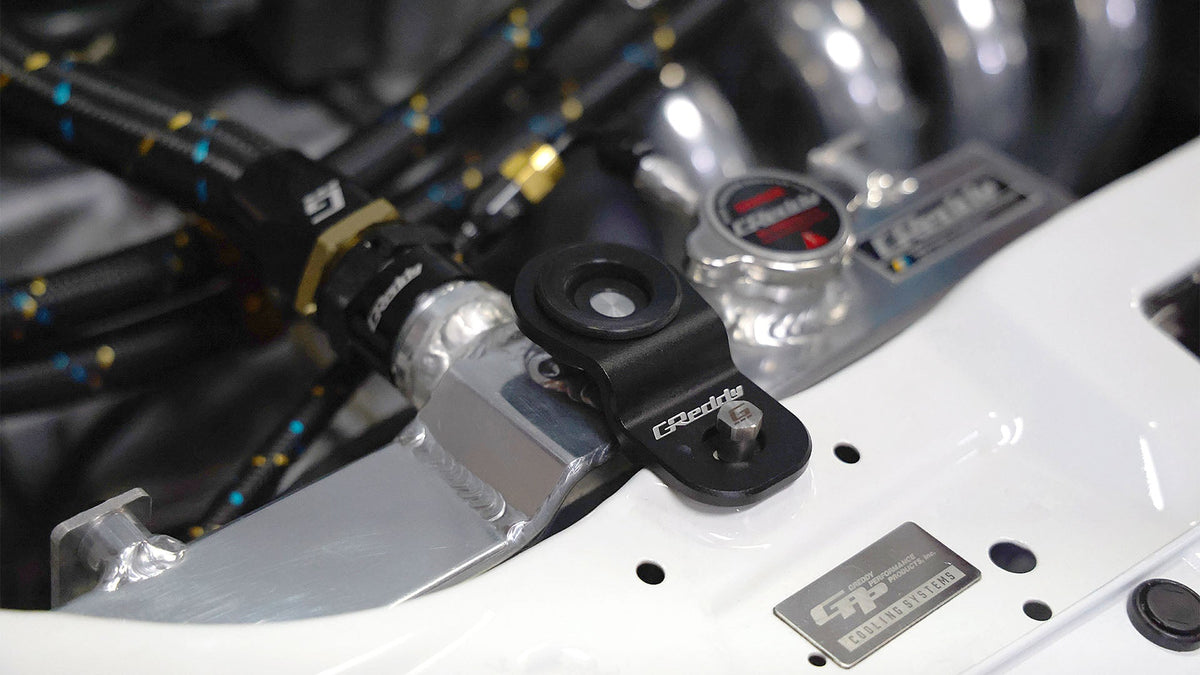 GREDDY EK BILLET RADIATOR MOUNT BRACKET - (12053901)